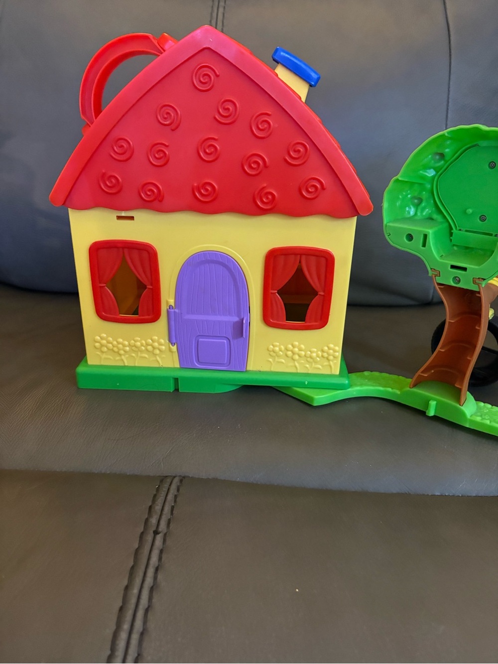 Bright Multicolor Kids Playhouse Toy with Purple Door and Red Roof